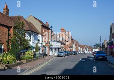 Wokingham, UK - February 28, 2021:  View along the historic Rose Street in Wokingham, Berkshire on a sunny Spring day.  Some of the houses date back t Stock Photo