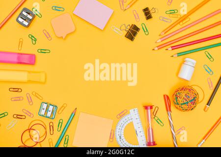 Back to school concept, school supplies on yellow background,flat lay with copy space Stock Photo
