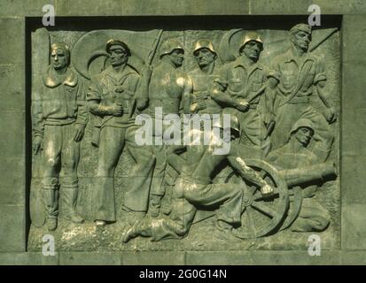 Heroic relief of soldiers at the controversial Monument to the Fallen of the Spanish Civil War at Santa Cruz de Tenerife. It was errected 1947 with forced labour by political prisoners of the Franco Regime. Since 2019 is a discussion about a 'resignification' process. Stock Photo
