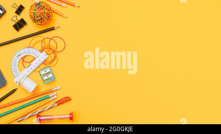 Back to school concept, school supplies on yellow background,flat lay with copy space Stock Photo