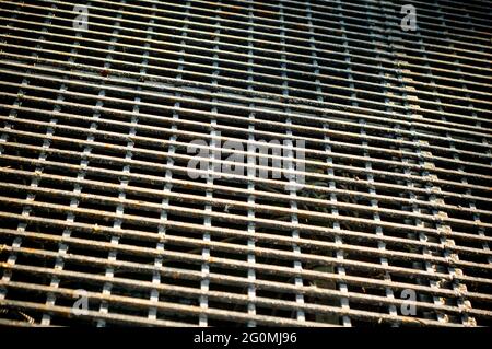 An iron mesh background.  Metal grid texture Stock Photo