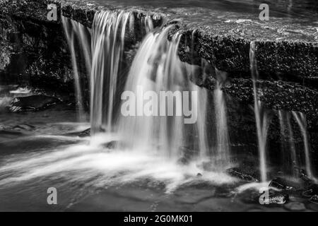 A small cascade on the Burn Anne Water near Galston in East Ayrshire, Scotland. Stock Photo