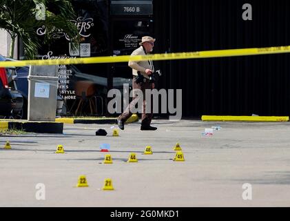 Miami Gardens, USA. 30th May, 2021. Miami-Dade police investigate a mass shooting at a concert that killed two people and injured more than 20 others in North Miami-Dade, near Miami Gardens, Florida, on Sunday, May 30, 2021. (Photo by Carl Juste/Miami Herald/TNS/Sipa USA) Credit: Sipa USA/Alamy Live News Stock Photo
