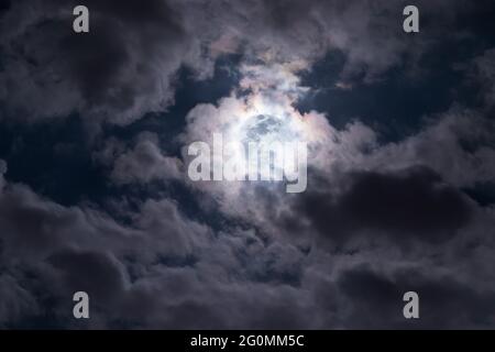 A full bright moon shining over Brunei Darussalam. This photo is edited to make the moon appear larger than it is. Stock Photo