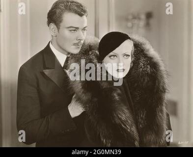 Nils Asther. 1897-1981. Swedish actor who was succeful in Hollywood an starred in movies against Greta Garbo. Pictured here while filming the movie Letty Lynton with Joan Crawford 1932 Stock Photo