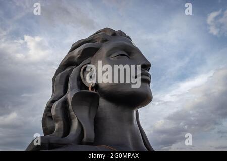 adiyogi lord shiva statue from unique different angles image is taken at coimbatore india showing the god statue in mountain and sky background. This Stock Photo