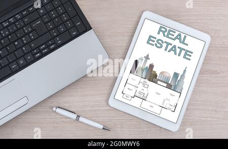 Real estate concept shown on a digital tablet Stock Photo