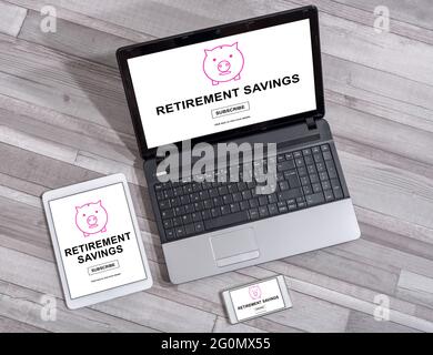 Retirement savings concept shown on different information technology devices Stock Photo