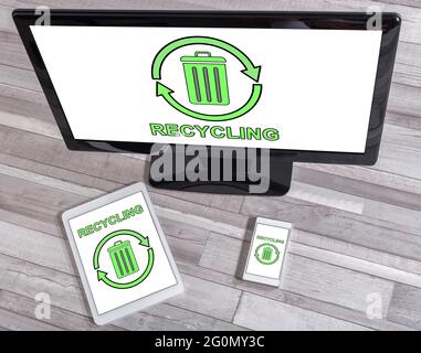 Recycling concept shown on different information technology devices Stock Photo