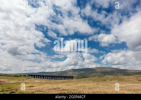 Stunning panoramic view of Whernside with the Ribblehead Viaduct on a sunny day, Yorkshire Dales National Park, UK