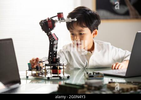 Students learning robot programming Stock Photo