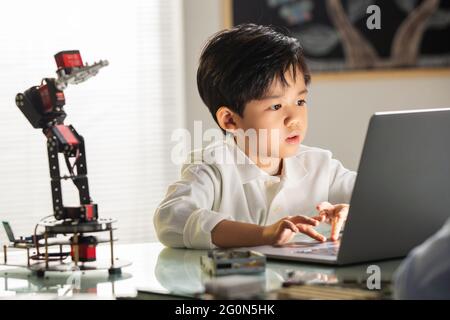 Students learning robot programming Stock Photo