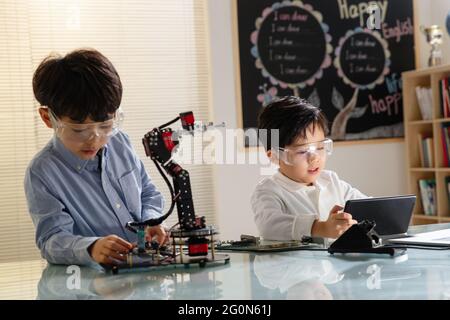 Students learning robot programming Stock Photo