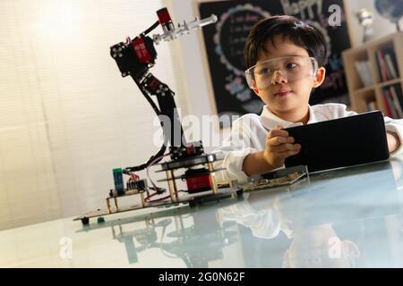 Students learning robot programming Stock Photo