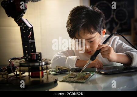 Students learning robot programming Stock Photo