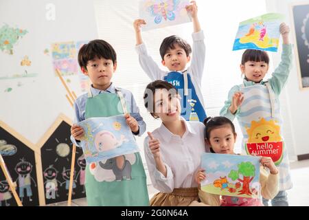 Happy children's art class took a trip Stock Photo