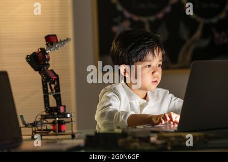 Students learning robot programming Stock Photo