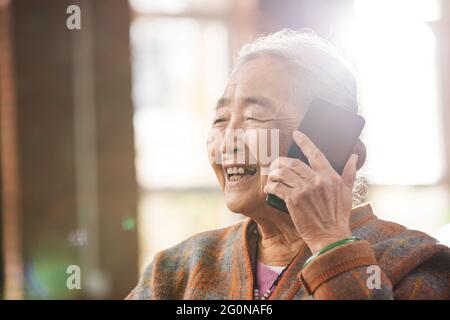 The elderly using a mobile phone call Stock Photo