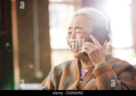 The elderly using a mobile phone call Stock Photo