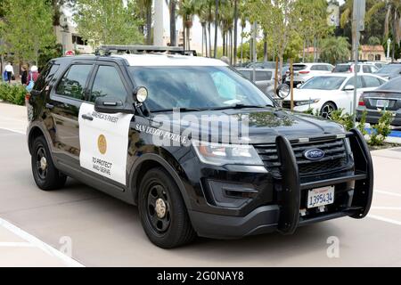 Black and white police suv of the San Diego Police Department at Balboa Park Stock Photo