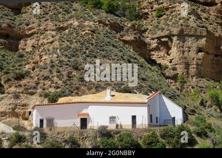 Cárcavas de Marchal (Spain), natural monument of Andalusia: cave houses are dwellings excavated in the foothills of the badlands Stock Photo