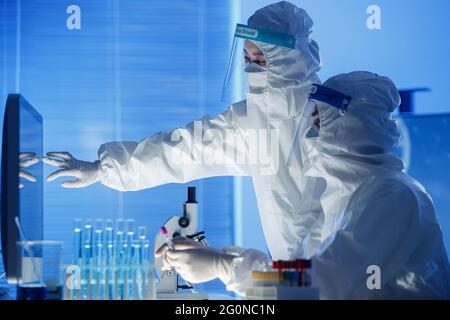 Medical workers do medical experiments Stock Photo