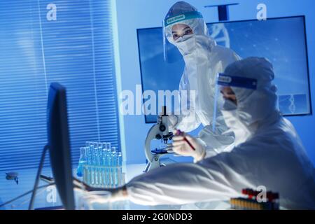 Medical workers do medical experiments Stock Photo