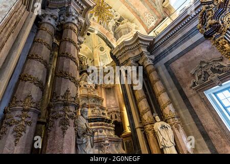 The interior of the Clerigos Church (Church of the Clergymen) is a Baroque church in the city of Porto, in Portugal. Stock Photo