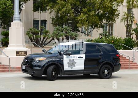 Sheriff vehicle of the San Diego Police Department parked outside the County admin building. Stock Photo