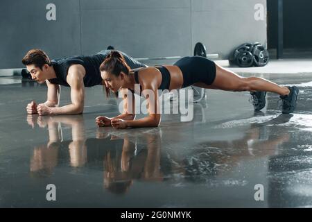 Young people in the gym and do tablet Stock Photo