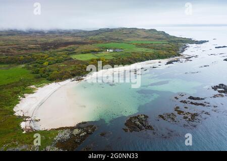 Aerial view of beach on Claggain Bay near Ardtalla Farm on east coast of Islay, Inner Hebrides, Scotland, UK Stock Photo