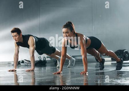 Young people in the gym to work out Stock Photo
