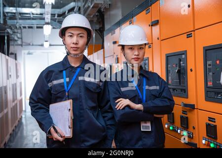 Technicians work in a factory Stock Photo