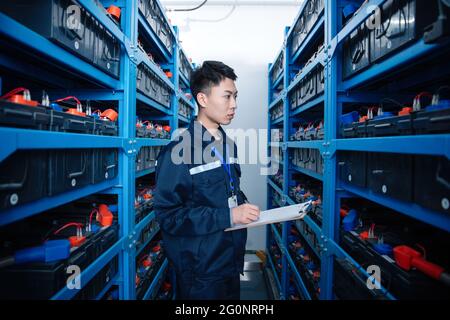 Technicians work in a factory Stock Photo