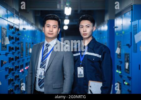 Technical personnel with leadership in the factory inspection Stock Photo