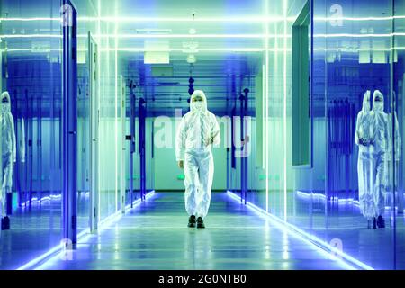 Wearing dusters of technical personnel in the hallway Stock Photo