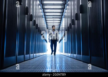 Technicians check in the computer room Stock Photo
