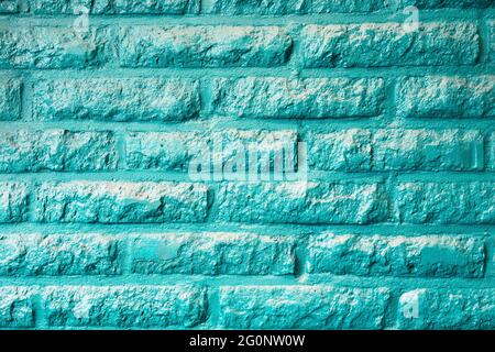 Turquoise or Auqua mint green brick wall background texture modern desing. Retro pastel colored abstract style Stock Photo