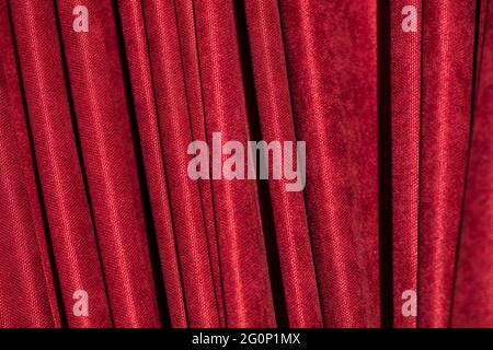 Red curtain in theatre. Textured background Stock Photo