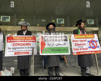 CUNY students and others demonstrate at John Jay College for CUNY to divest and cut all ties with Israel who is devestating the Palestinian people in Gaza and elsewhere in Israel. Orthodox Rabbis opposed to Zionism and the State of Israel. Stock Photo