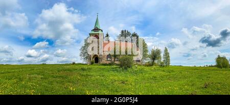 Panorama of Church Of The Divine Heart Of The Lord in small village Borovnicka, Pokrkonosi region in Czech republic built in 1928 Stock Photo