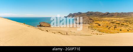 Panoramic shot of eroded lava formations in Monsul beach in Almeria, Spain Stock Photo