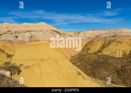 View of the Yellow Mounds, formed of Yellow Mounds Paleosol, in Badlands National Park, South Dakota, USA Stock Photo