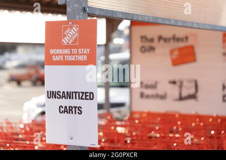 January 16 2021 - Calgary , Alberta Canada - Unsanitized Home depot orange shopping carts - Covid 19 pandemic measures Stock Photo