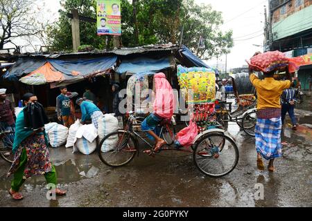 Colorful cycle rickshaws roaming the streets of Dhaka, Bangladesh. Stock Photo