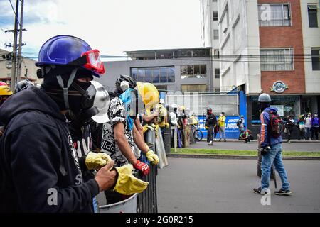 Pasto, Narino, Colombia. 2nd June, 2021. The called ''first line'' prepares to confront riot polce members in the context of the national strike in Pasto, Narino on June 2, 2021 during an anti-government protest against president Ivan Duque's tax and health reforms and unrest and violance caused in police abuse of power cases that leave at leas 70 dead since the protests errupted back on april 28. Credit: Camilo Erasso/LongVisual/ZUMA Wire/Alamy Live News Stock Photo