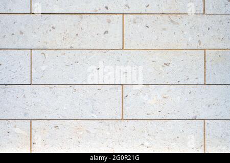 Background from a wall with rectangular granite stone slabs Stock Photo