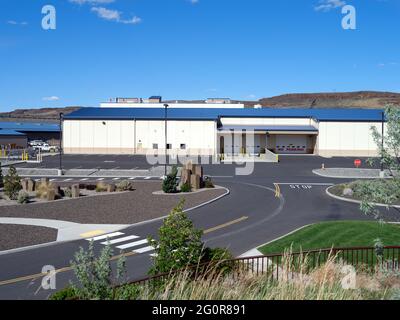 A Building with loading docks at an industrial complex Stock Photo