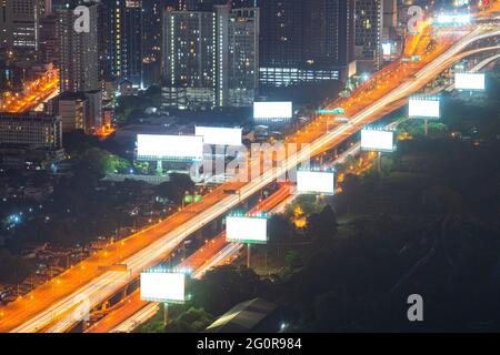 white copy space background on ad beside highway with car transportation billboard for communication in advertisement business by empty template scree Stock Photo