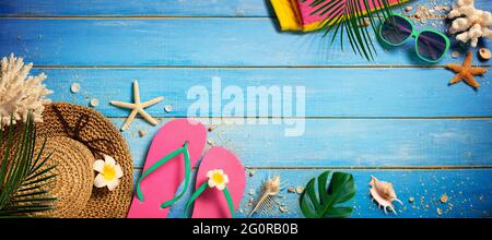 Beach Accessories On Blue Wooden Plank - Vacation Concept Stock Photo